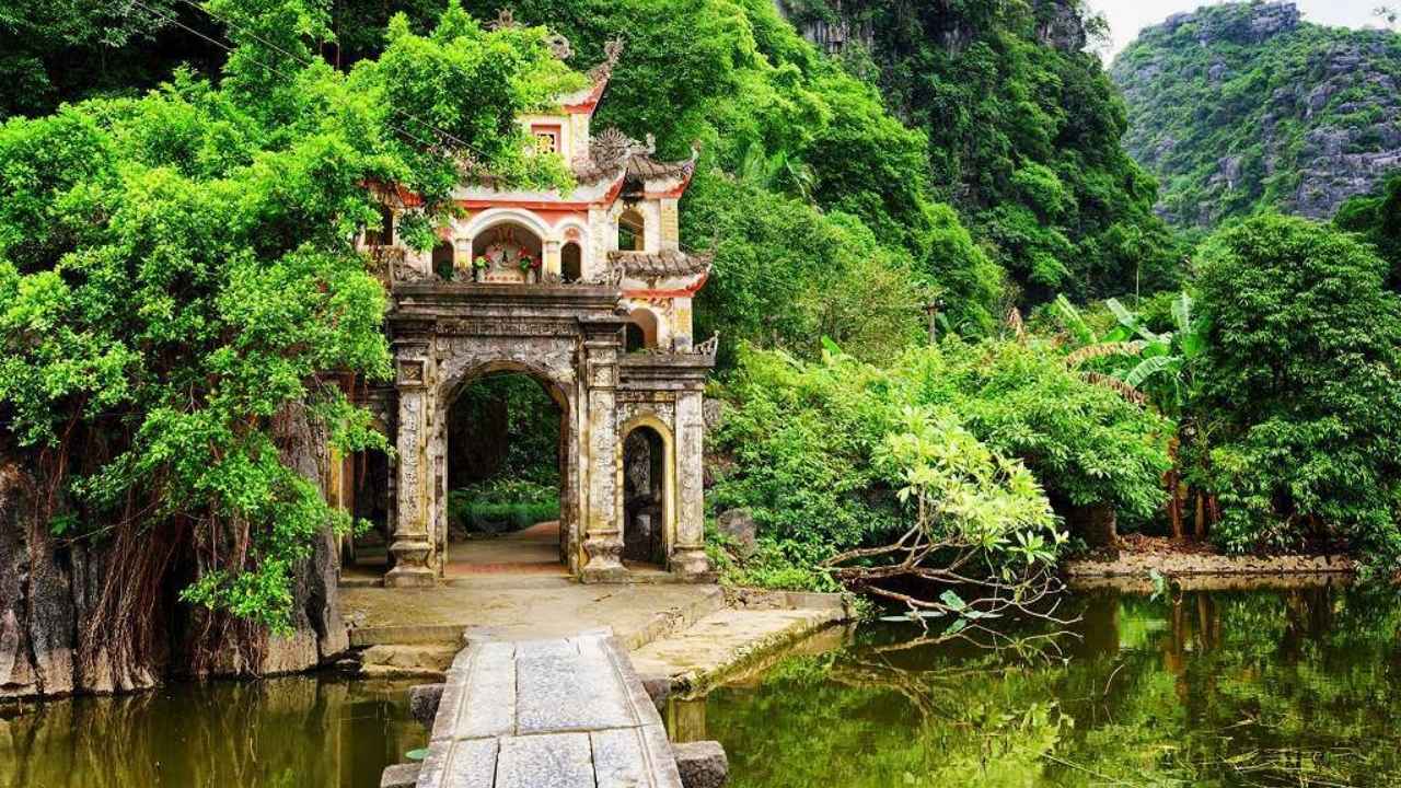 Ninh Binh Travel Guide 2026: Scams, Tips & Halong on Land Bich Dong Pagoda ancient stone gate