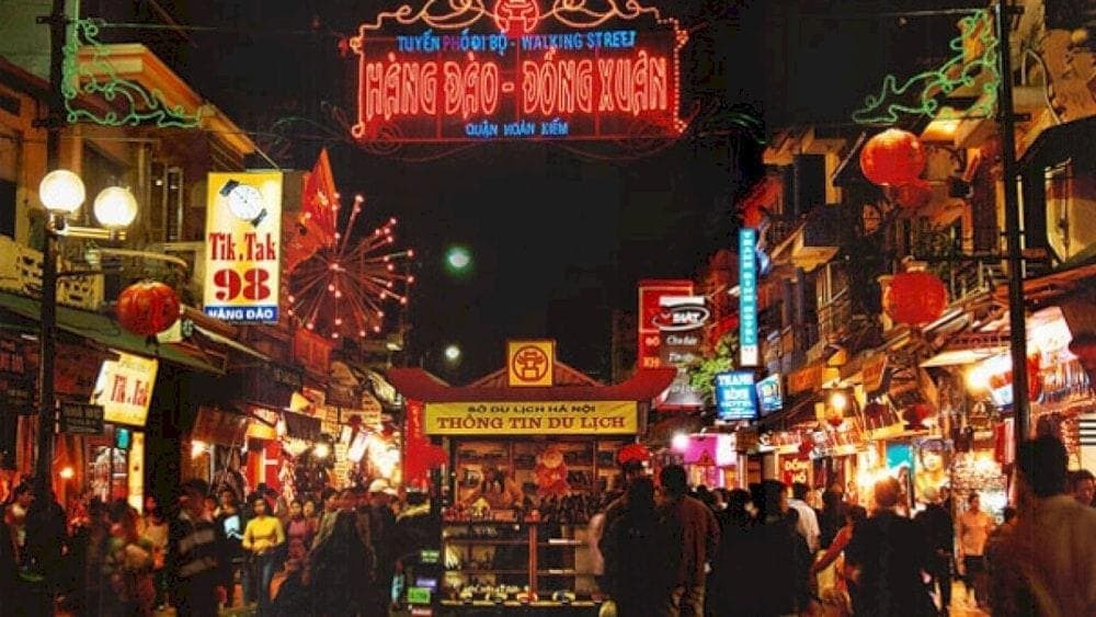 Hanoi best things to do & travel guide Hanoi Old Quarter Night Market with vendors and colorful lights