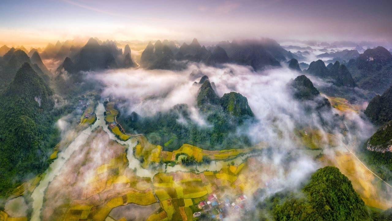 Cao Bang Travel Guide Phong Nam Valley with rice paddies and limestone mountains