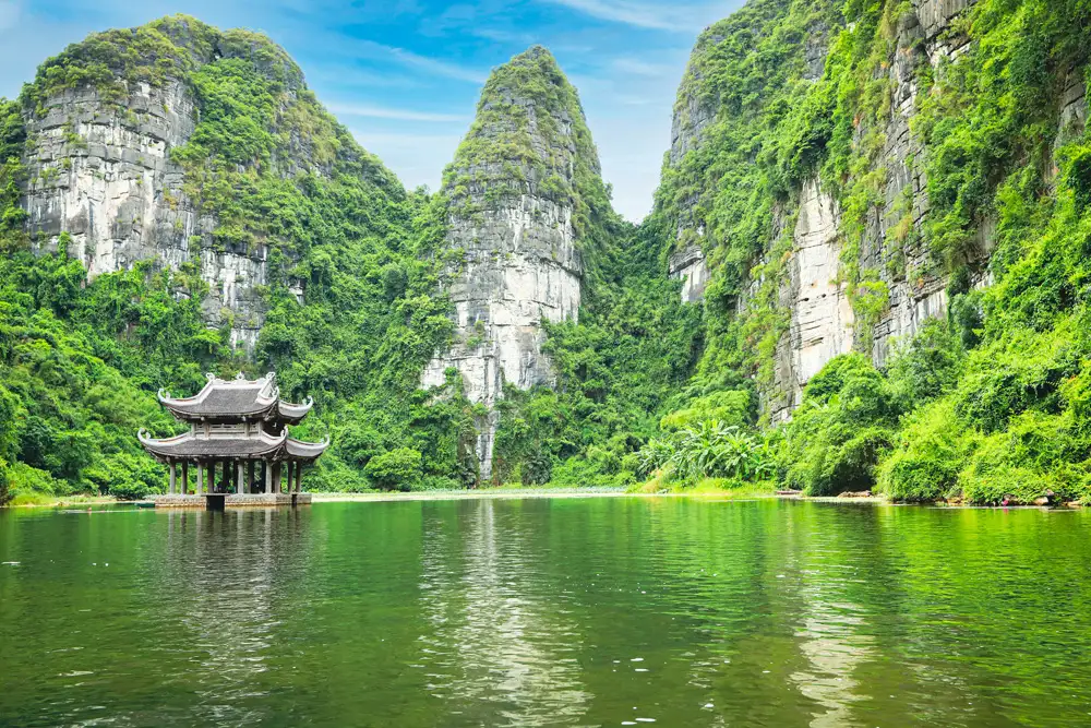 Hanoi best things to do & travel guide Ninh Binh Tam Coc boat ride through karsts and rice paddies