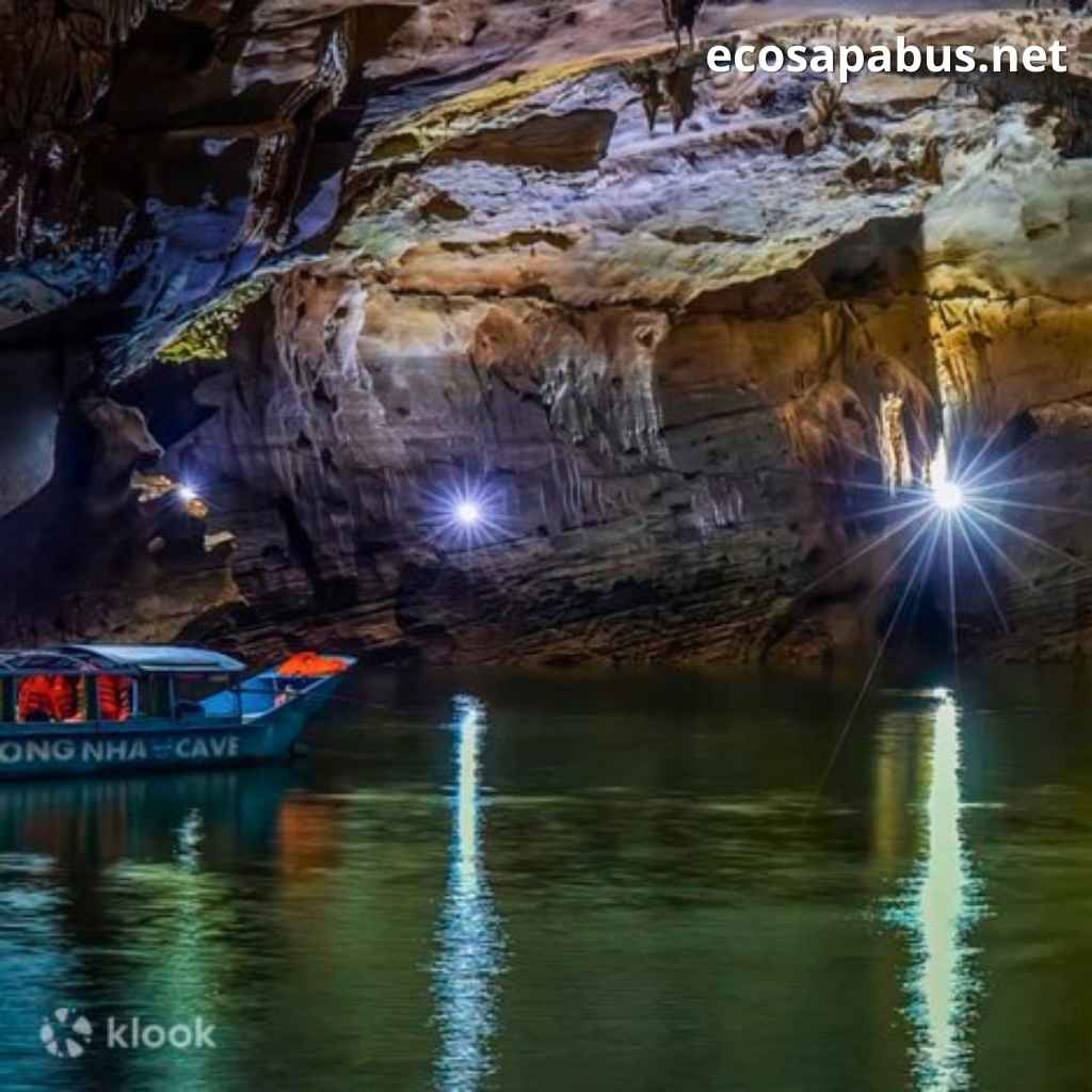 Phong Nha river boat tour karst mountains reflection