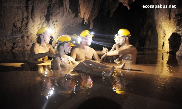 Dark Cave Vietnam zip line mud swim adventure