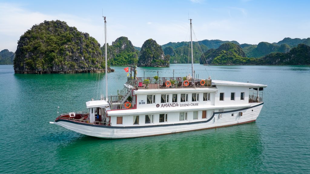 Amanda Legend Cruise sailing through Halong Bay / Bai Tu Long Bay