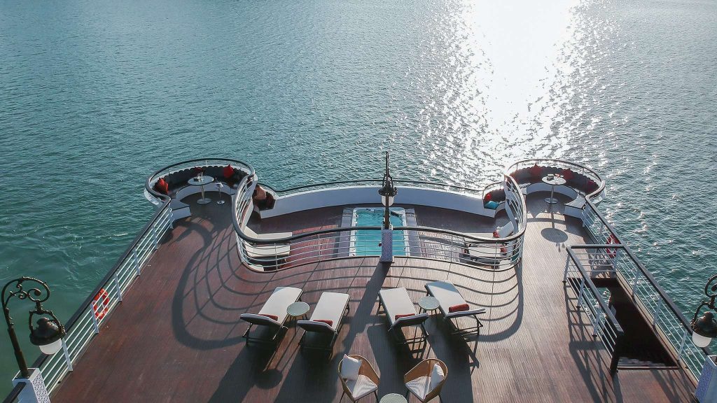 Ambassador Cruise sundeck and outdoor seating overlooking Halong Bay