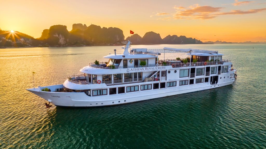 Athena Royal Cruise sailing through Bai Tu Long Bay