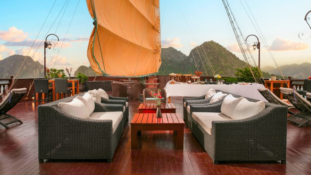 Emperor Cruises sundeck and outdoor seating overlooking Halong Bay