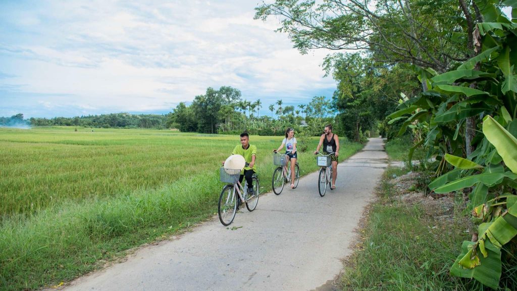 Enjoy A Bike Tour Through Thuy Bieu Village’s Green, Shaded Paths