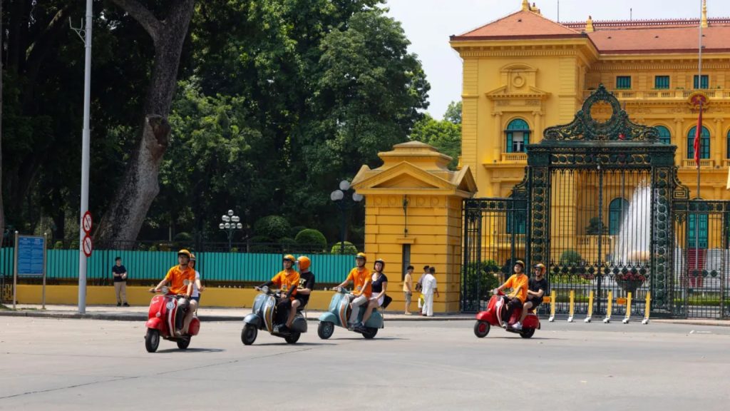 Experience Hanoi By Vespa Through Vibrant City Streets