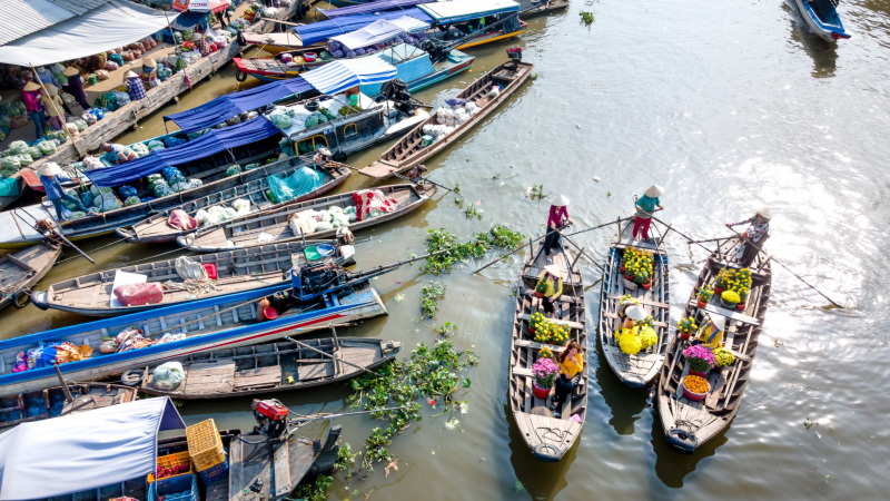 Experience The Unique Culture At Cai Be Floating Market