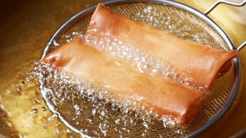 Fry Golden Spring Rolls Until Crispy And Delicious