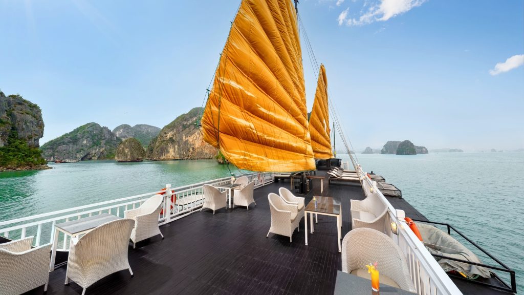 Garden Bay Peak Cruise sundeck and outdoor seating overlooking Bai Tu Long Bay