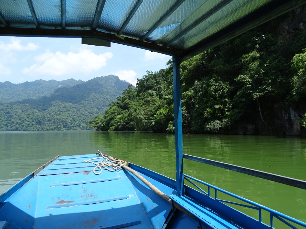Travelers on a boat at Ba Be Lake