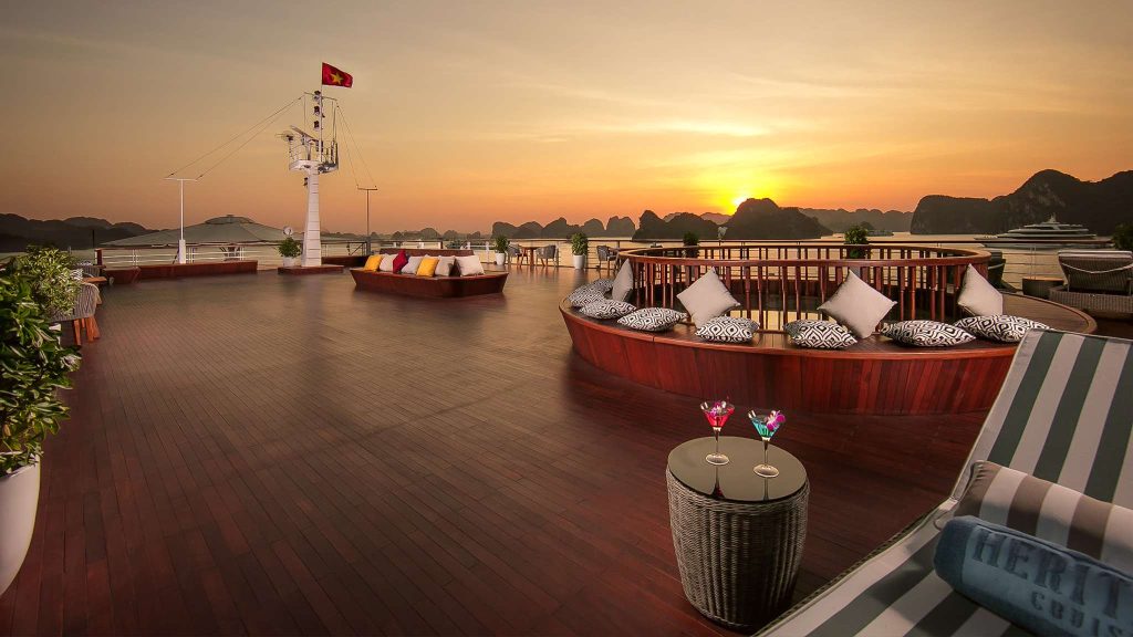 Heritage Binh Chuan Cruise sundeck and outdoor seating overlooking Lan Ha Bay