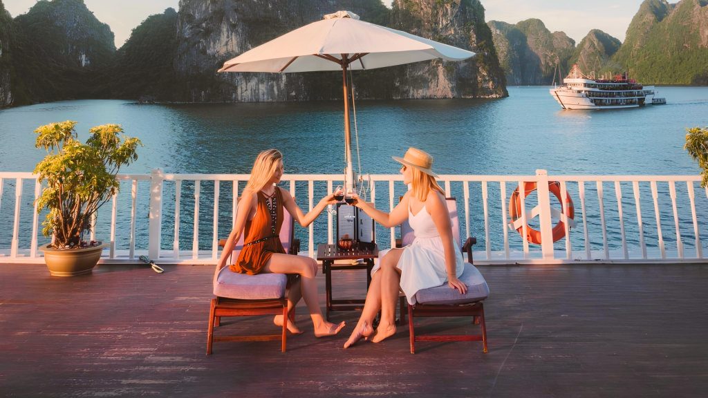 Indochina Sails sundeck and outdoor seating overlooking Halong Bay