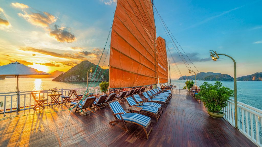 Indochina Sails sundeck and outdoor seating overlooking Halong Bay