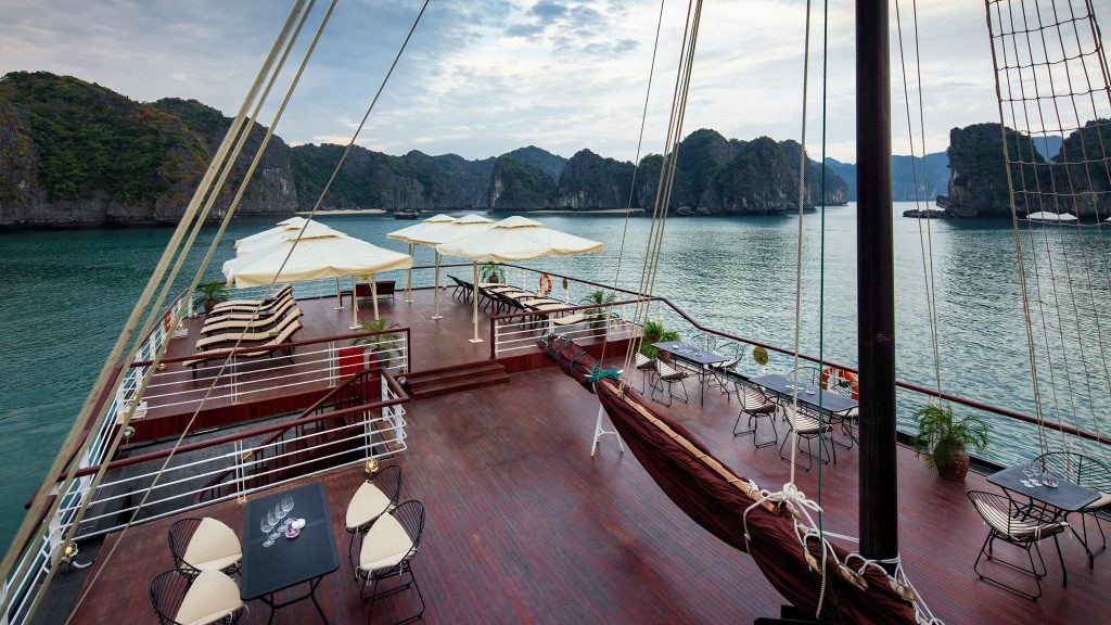 Orchid Classic Cruise sundeck and outdoor seating overlooking Lan Ha Bay - Cat Ba Island