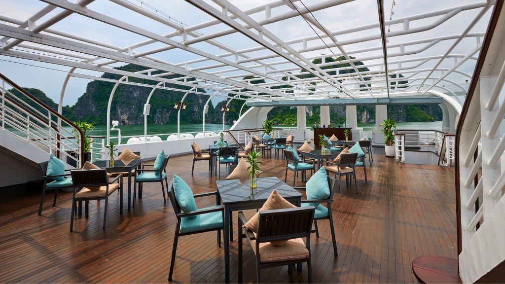 Paradise Delight Cruise sundeck and outdoor seating overlooking Halong Bay