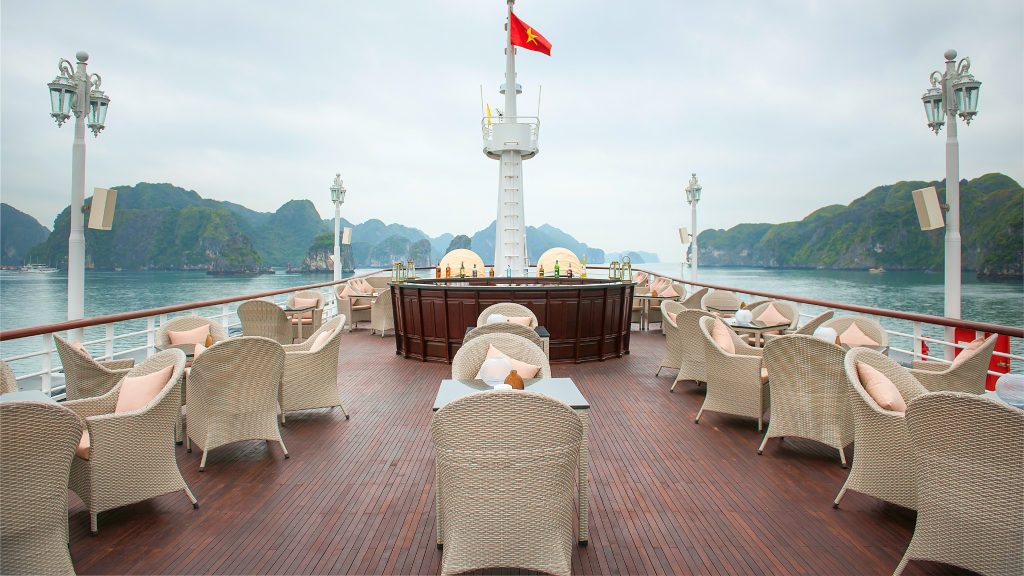 Paradise Elegance Cruise sundeck and outdoor seating overlooking Halong Bay
