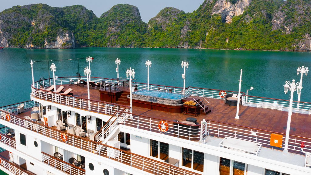 Paradise Elegance Cruise sundeck and outdoor seating overlooking Halong Bay