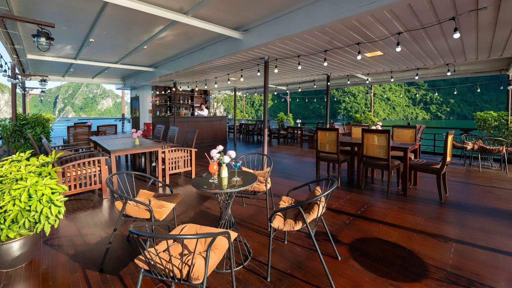 Phoenix Cruise sundeck and outdoor seating overlooking Halong Bay