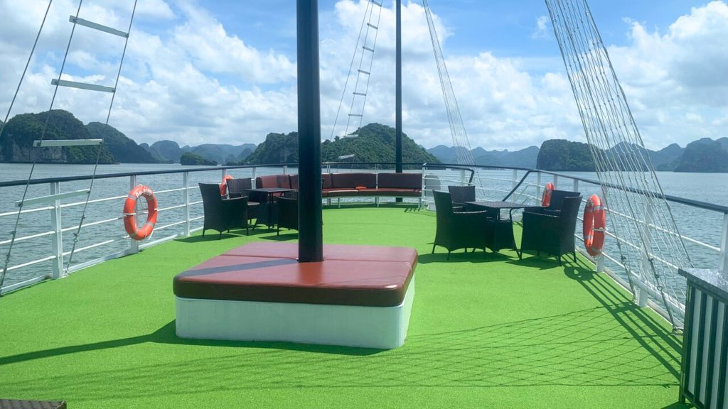 Phoenix Day Cruise sundeck and outdoor seating overlooking Halong Bay