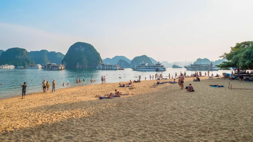 Relax On Titov Island With Its Soft Sandy Beach And Crystal Clear Waters