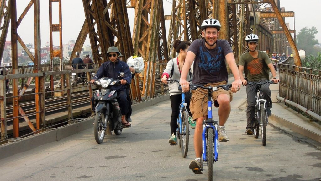 Ride Across The Ancient Long Bien Bridge – EcoSapa Bus