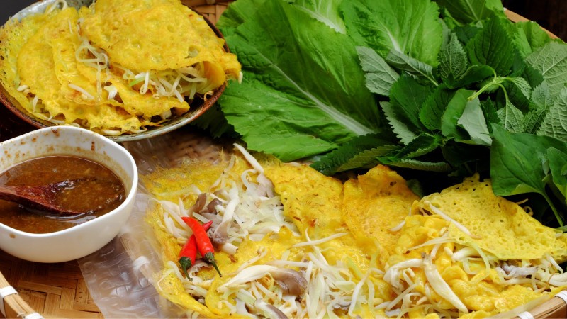 Savor The Crispy Banh Xeo On A Street Food Tour in Hanoi Real Life by Night