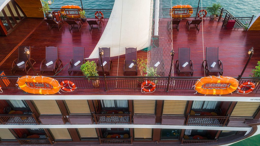 Sena Cruises sundeck and outdoor seating overlooking Lan Ha Bay
