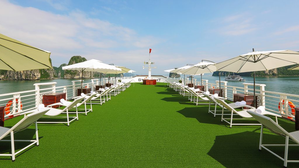 Starlight Cruise sundeck and outdoor seating overlooking Halong Bay - Lan Ha Bay