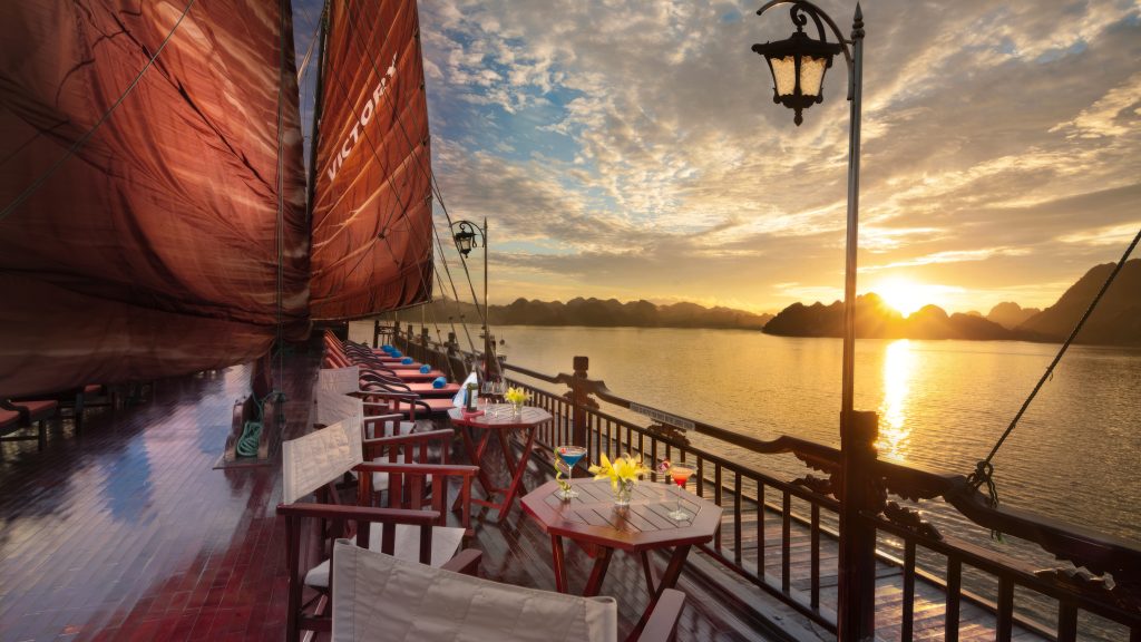 Victory Cruise sundeck and outdoor seating overlooking Halong Bay