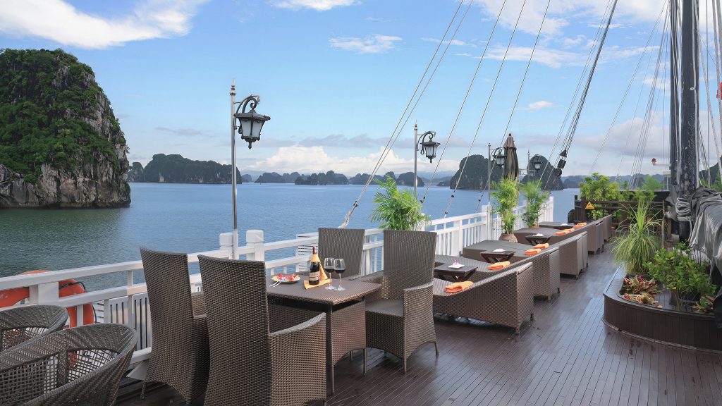 Victory Star Cruise sundeck and outdoor seating overlooking Halong Bay